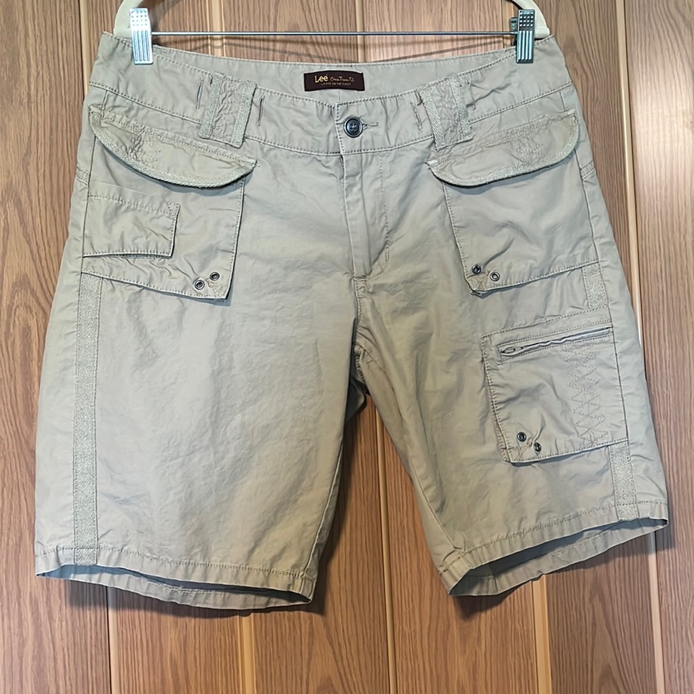 Lee 5 pocket tan shorts, size 14. Sits just below the waist. Missing drawstring